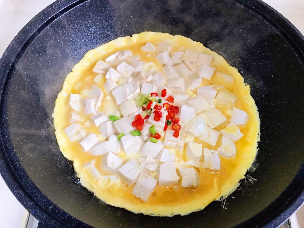 鸡蛋抱豆腐的做法