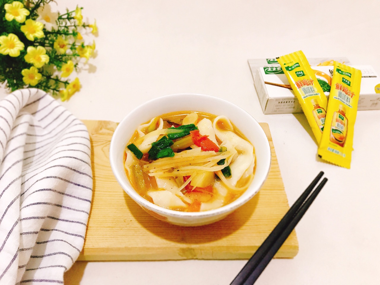 Hand made noodles with vegetable and chicken sauce