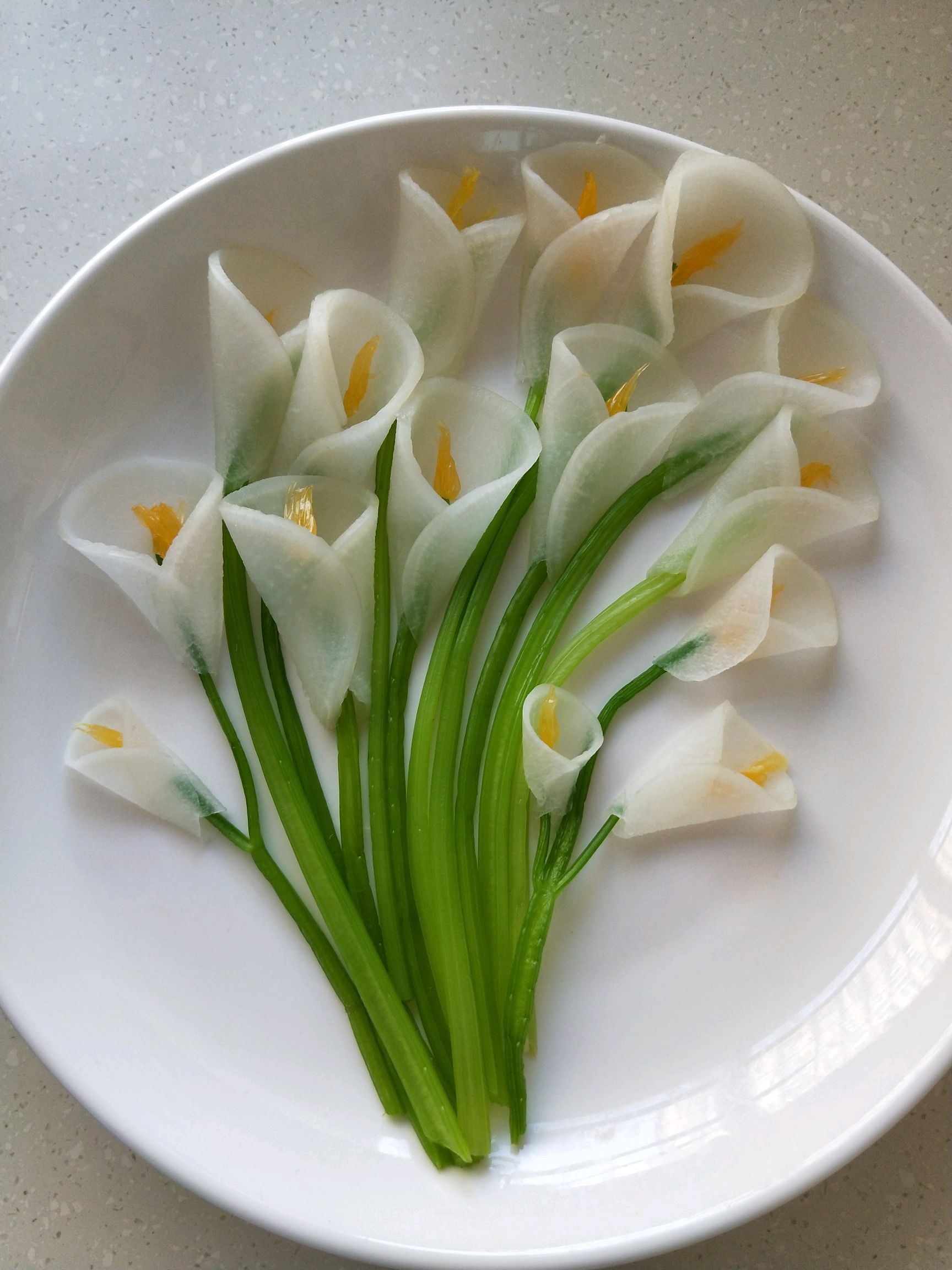 芹梗白萝卜花怎么做 芹梗白萝卜花的做法 豆果美食