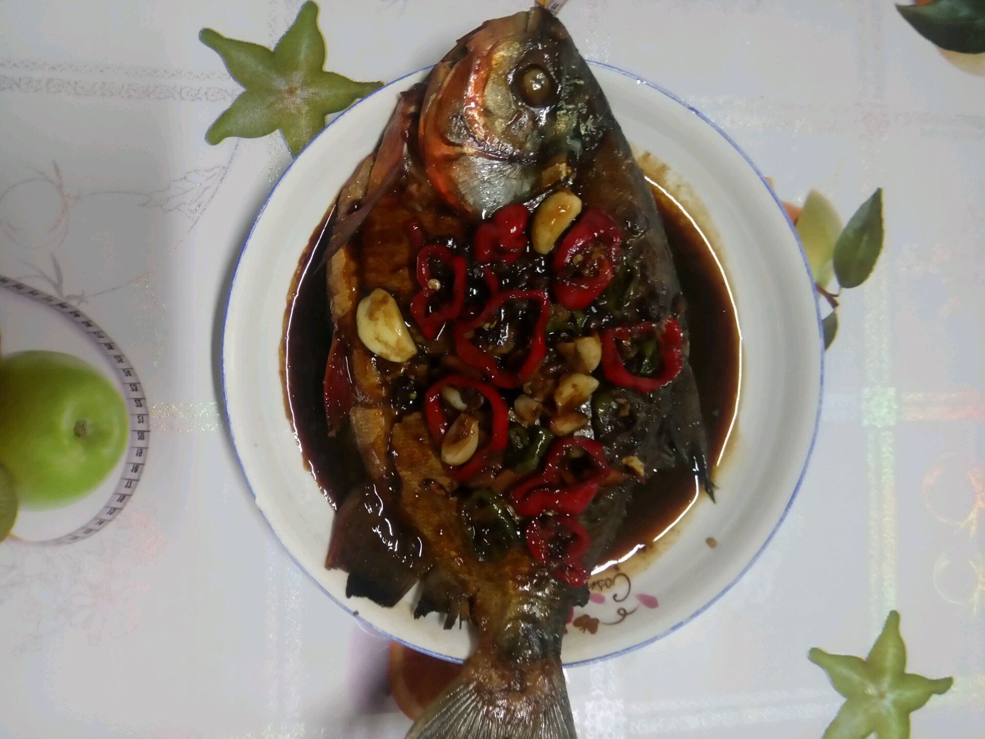 Stewed pomfret in red sauce