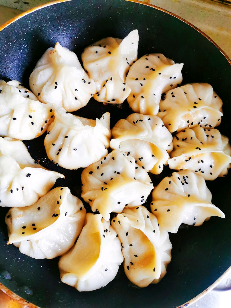 Stir fried dumplings with bamboo shoots and pork