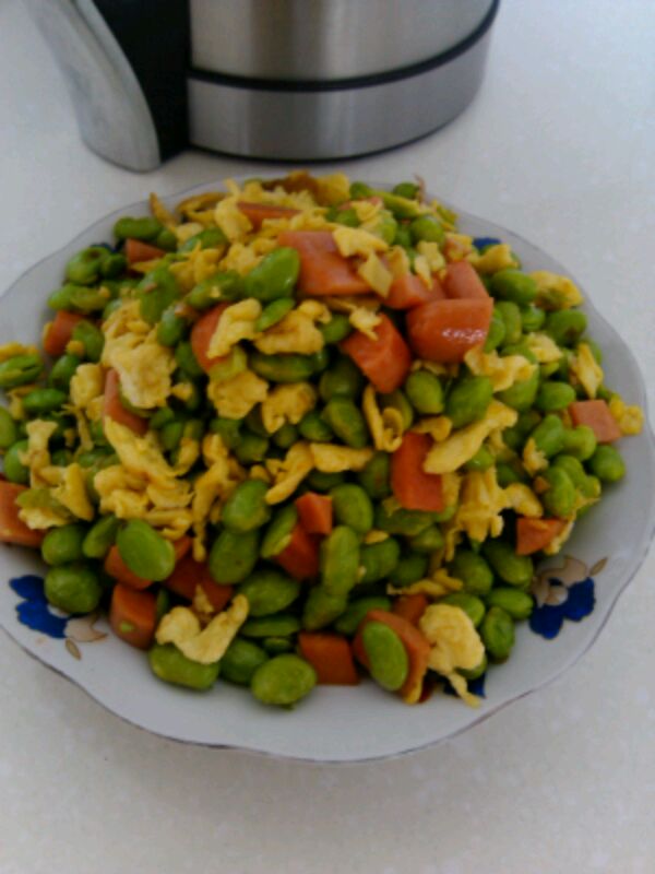 Sauteed peas with sausage and eggs