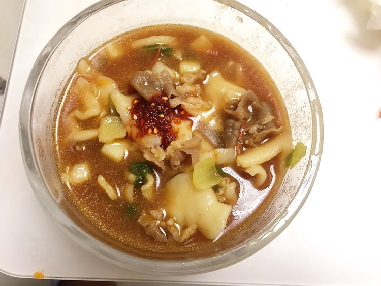 酸汤连锅揪面片的做法