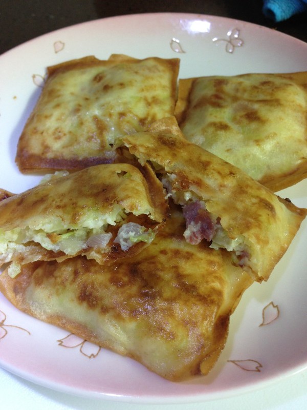 Mashed potatoes, cabbage, onion, bacon, spring rolls