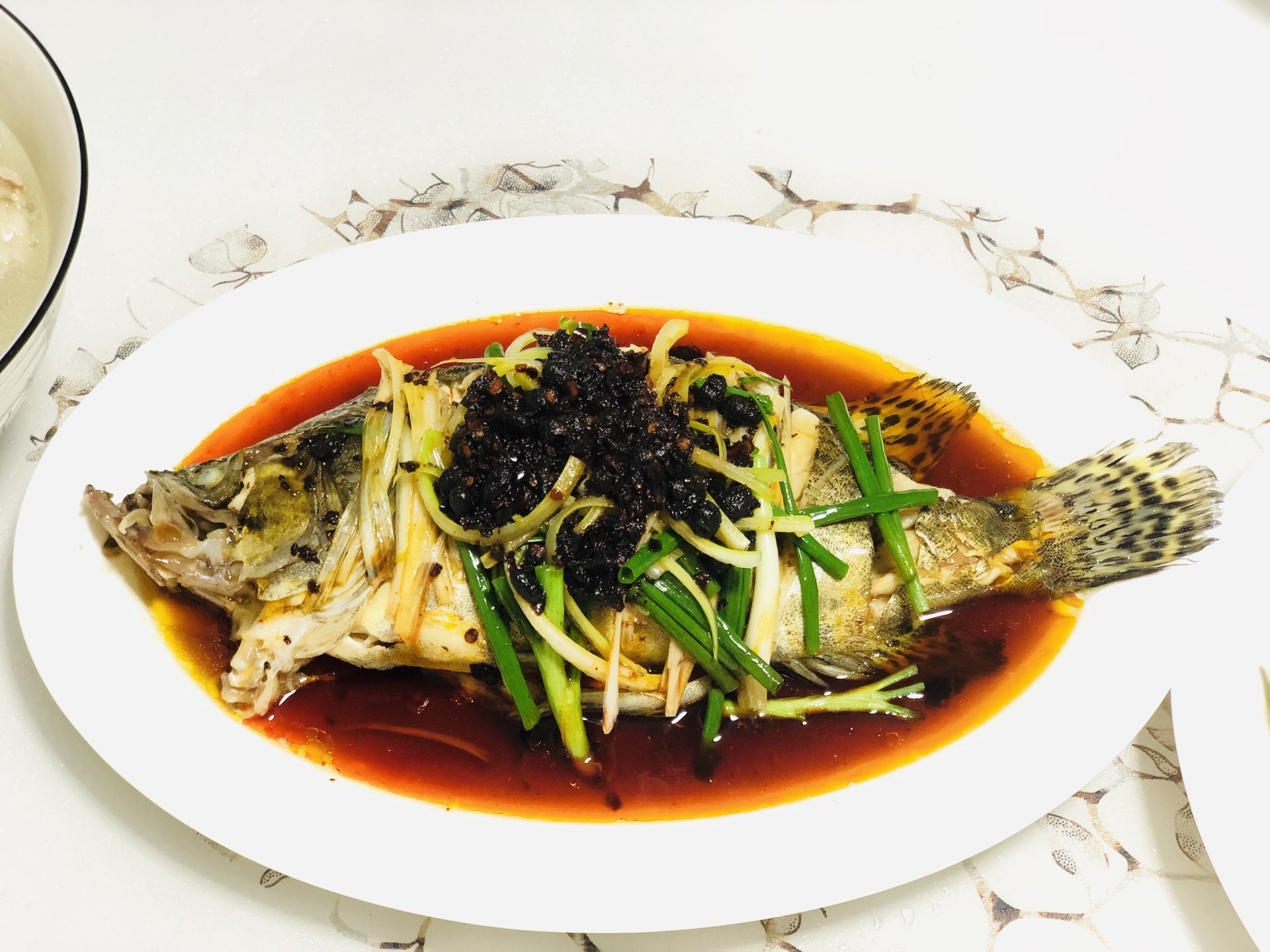 Mandarin fish with black bean sauce in spring