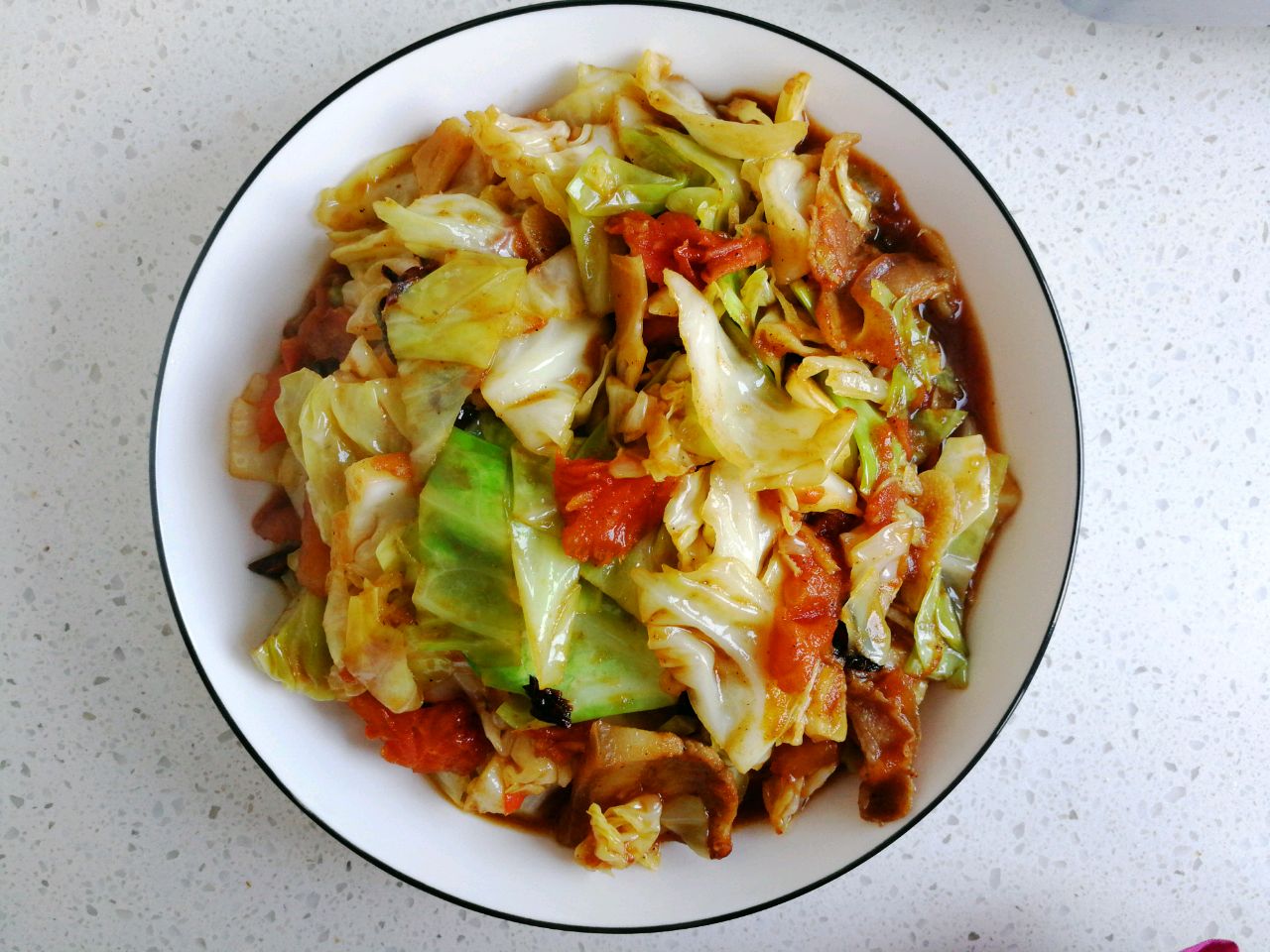 Fried cabbage with tomato