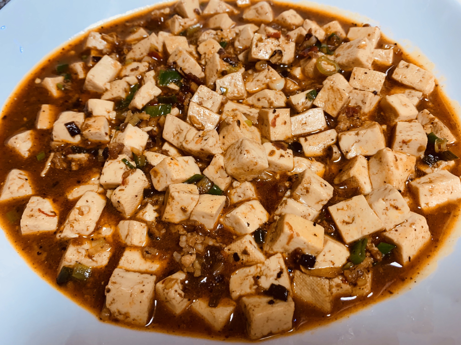 Home cooked dishes are made with heart. Red hot Mapo Tofu