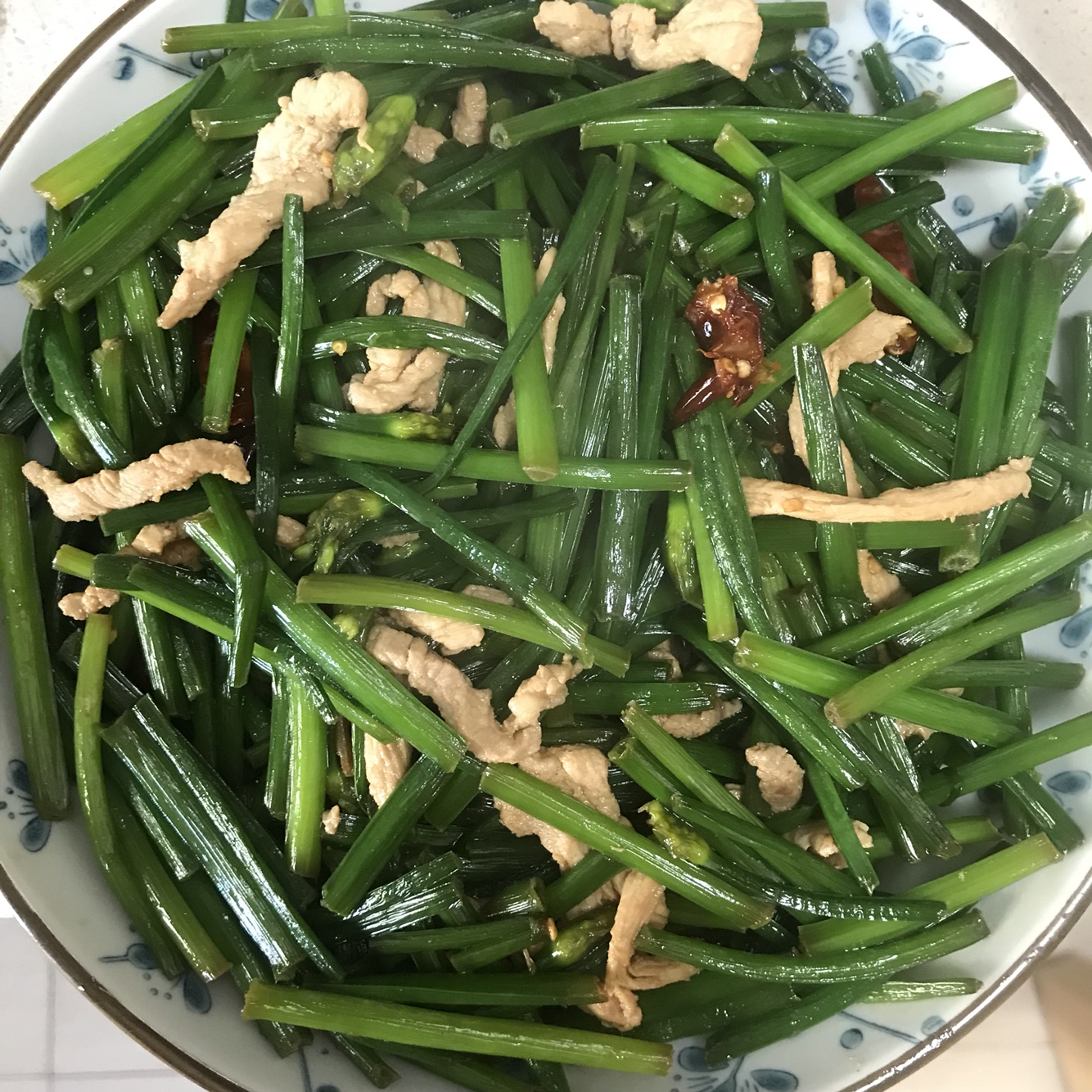 韭菜花炒肉丝怎么做 韭菜花炒肉丝的做法 豆果美食