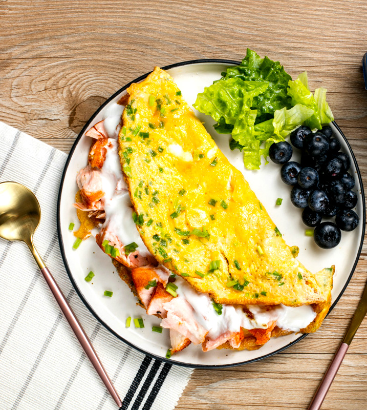 Fried salmon with egg and yoghurt