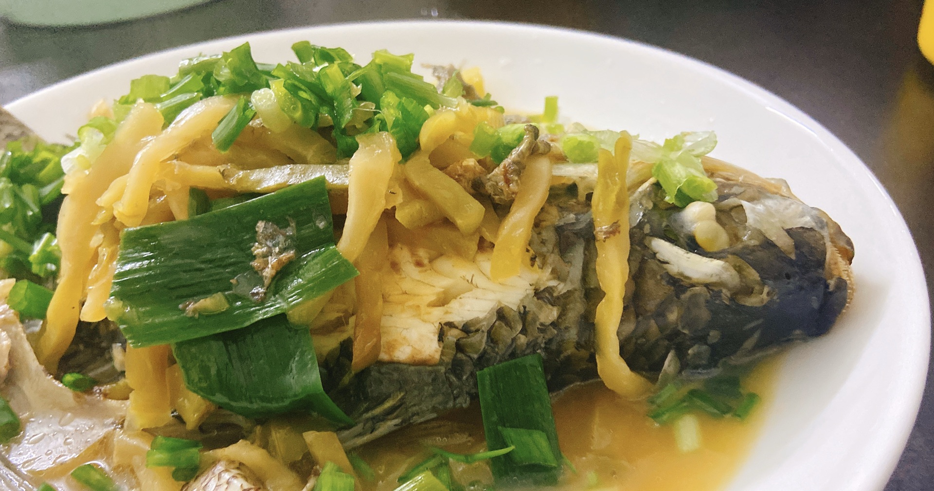 Braised tilapia with pickled mustard