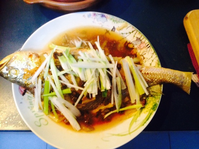 Steamed yellow croaker with pickled mustard and black bean