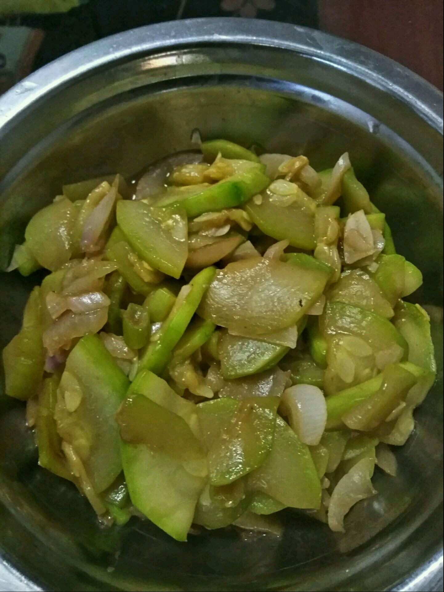 Fried zucchini with onion