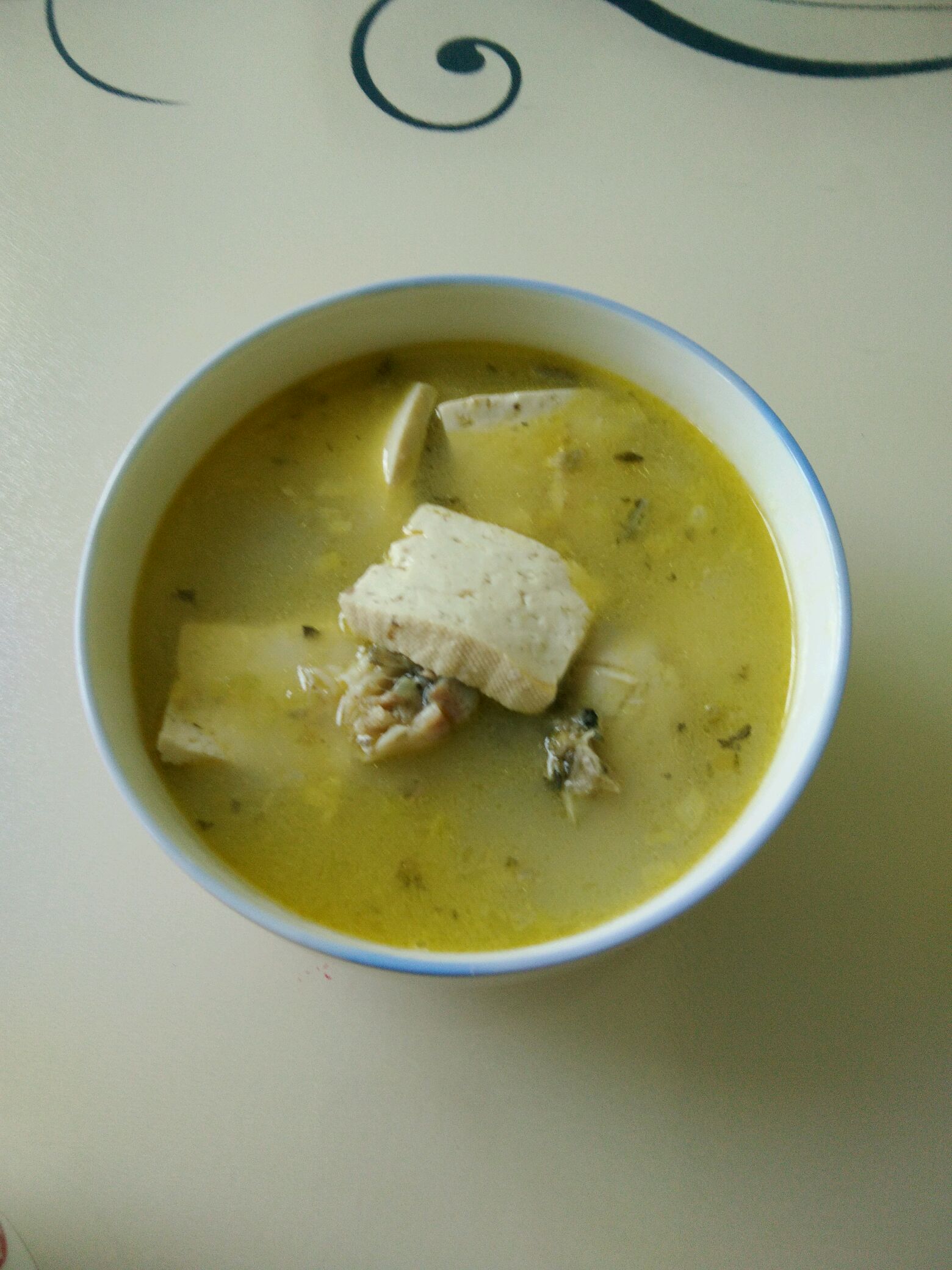 Small carp and tofu soup