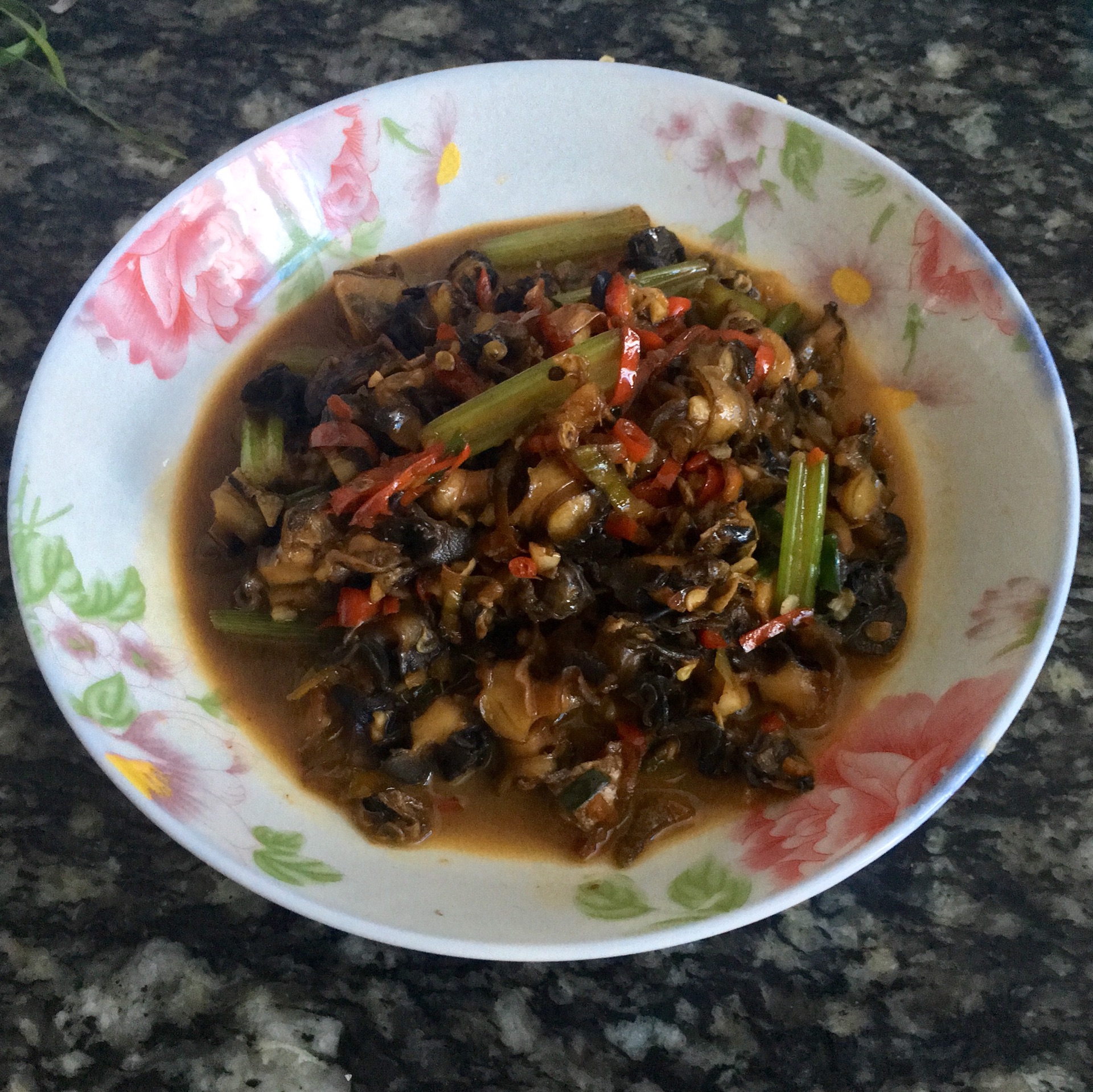 Stir fried conch with hot sauce