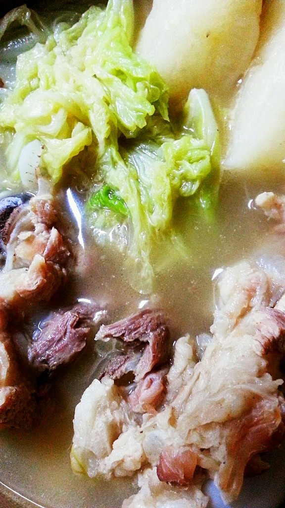 Stewed cabbage and radish with big stick and bone