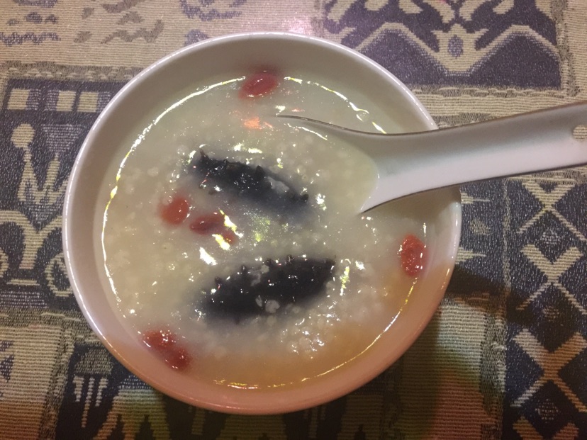 海参山药小米粥的做法图解4