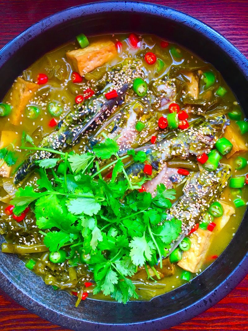 Sauteed fish with pickled vegetables and tofu
