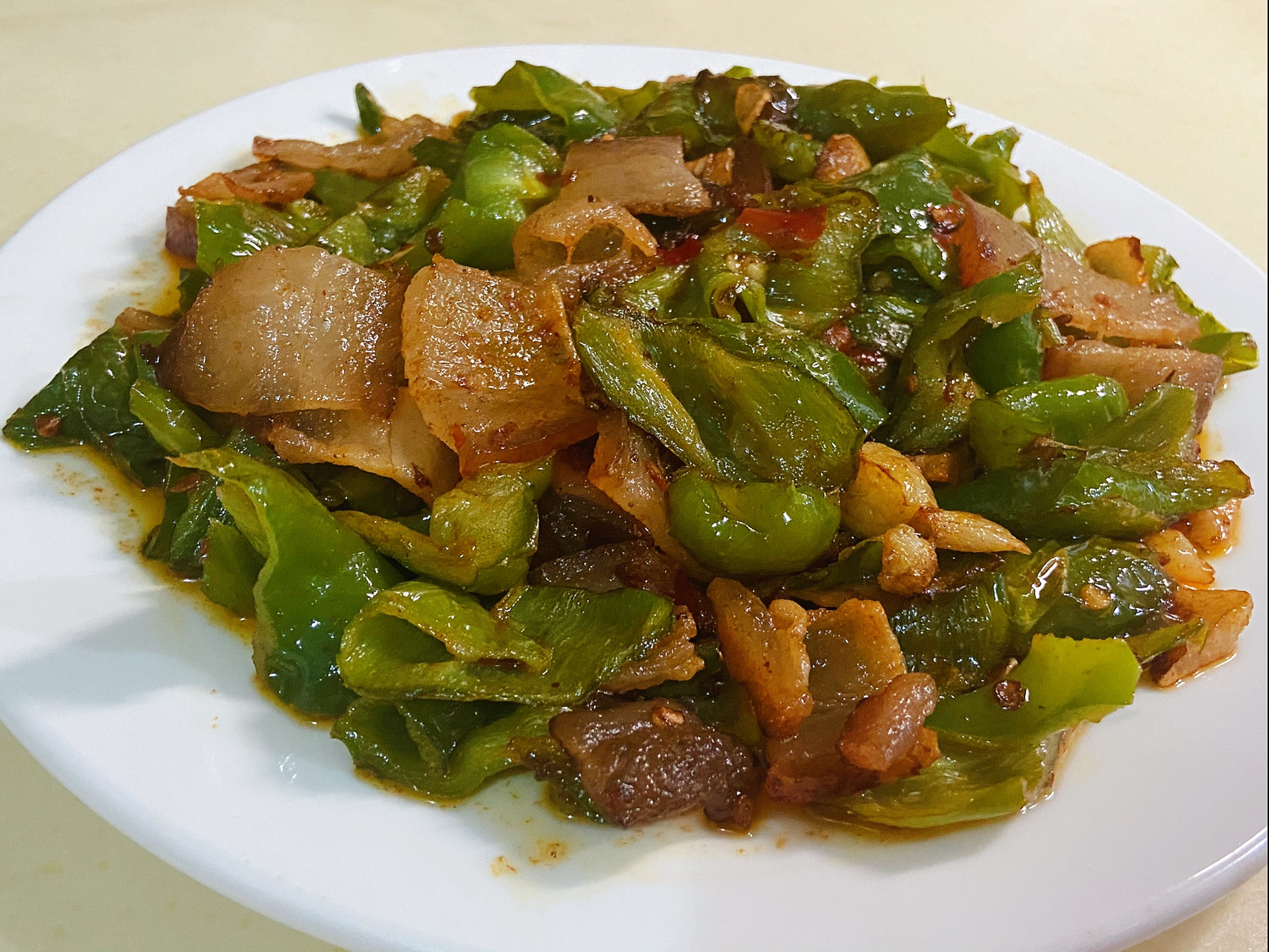 Stir fried bacon with green pepper