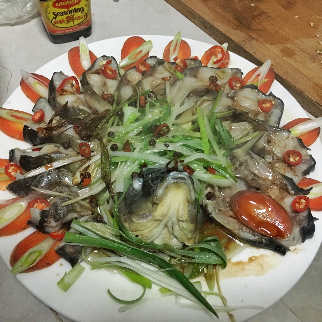 Steamed striped fish with peacock