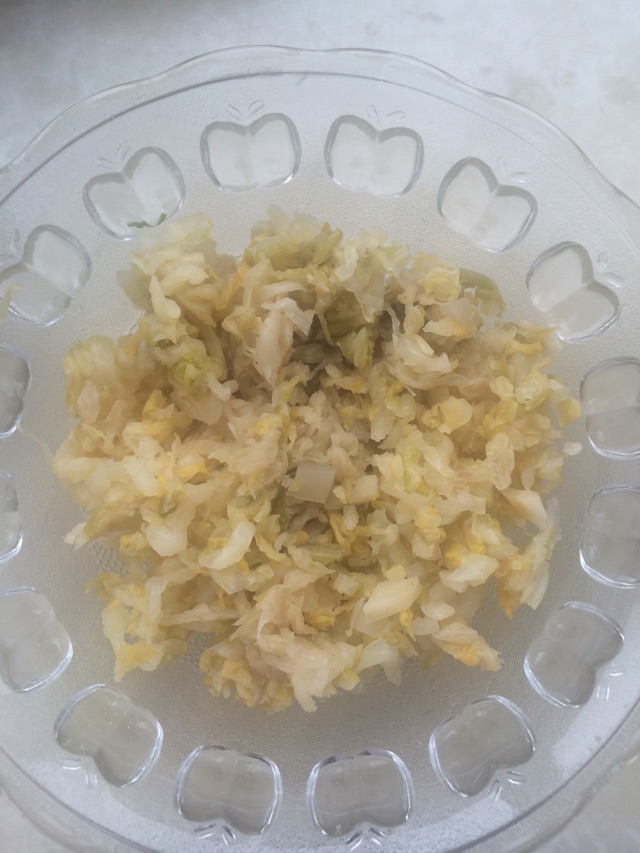 酸菜炒米的做法图解2