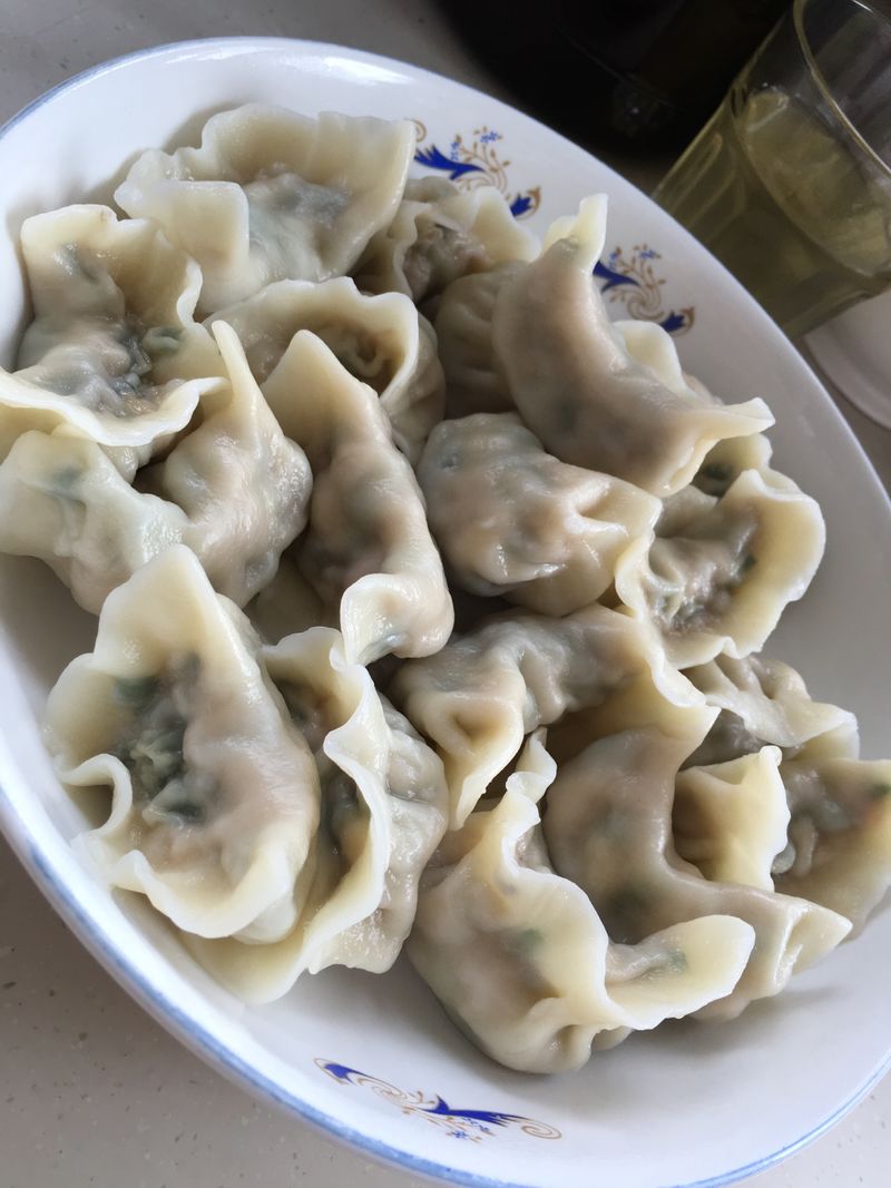 Dumplings with crab roe and leek