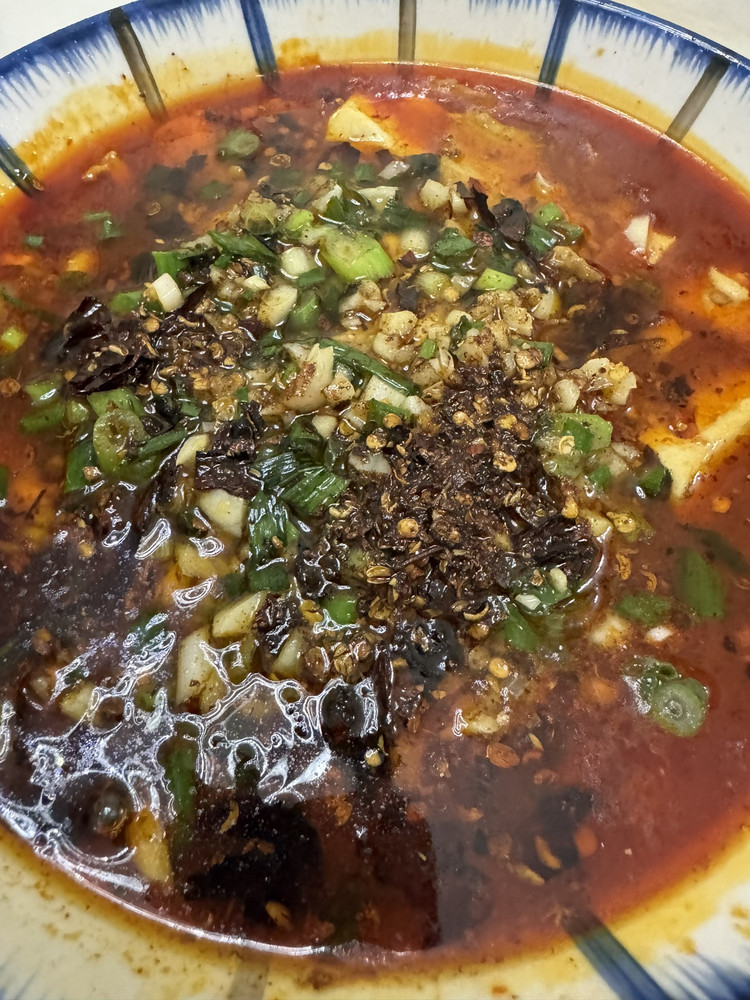 麻辣豆花肉片的做法