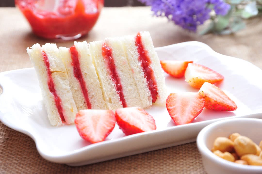 Homemade strawberry jam sandwich. Breakfast in three minutes