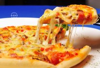 #2021趣味披萨组——芝香“食”趣#番茄肠仔拉丝披萨的做法