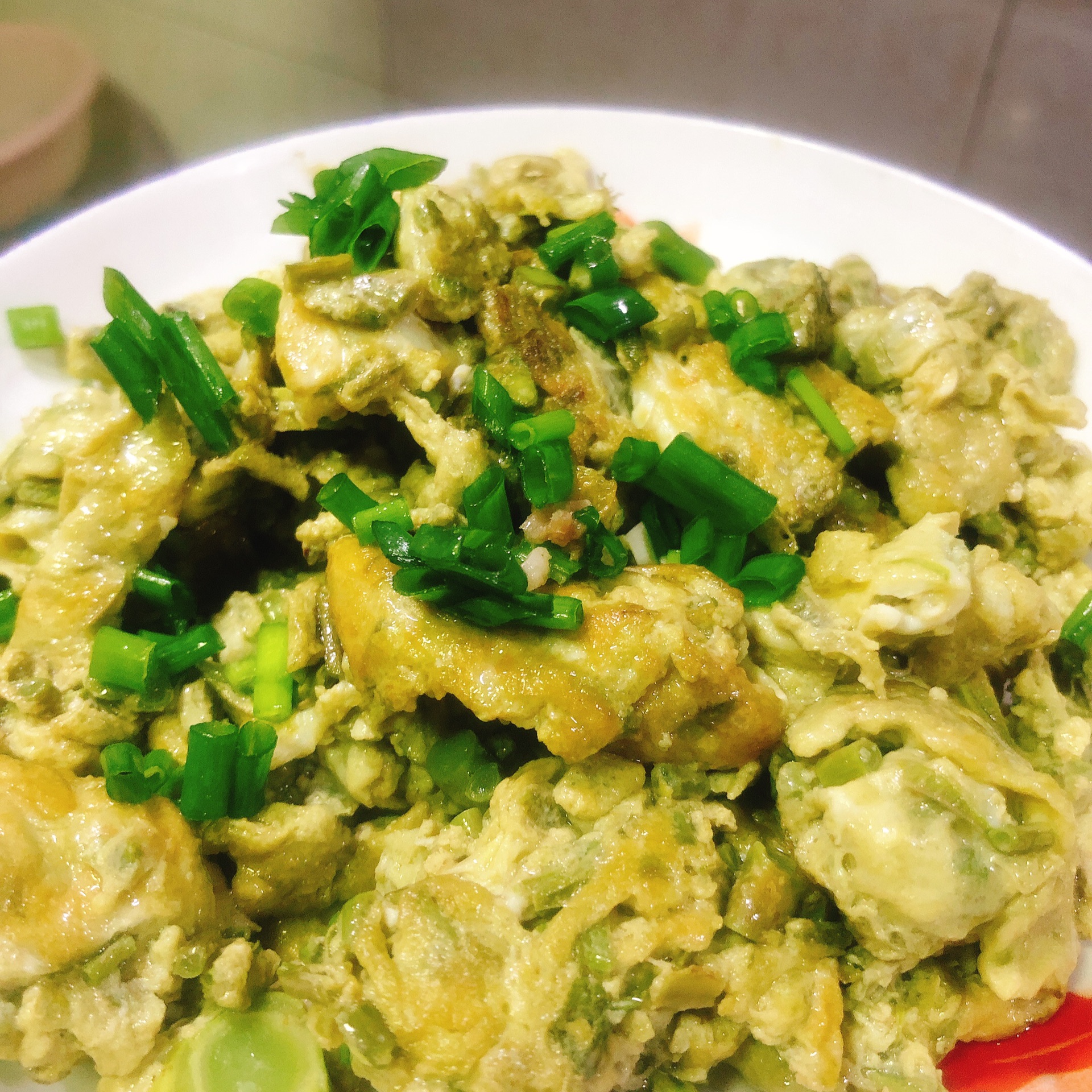 Stir fried goose egg with Chinese toon sprout