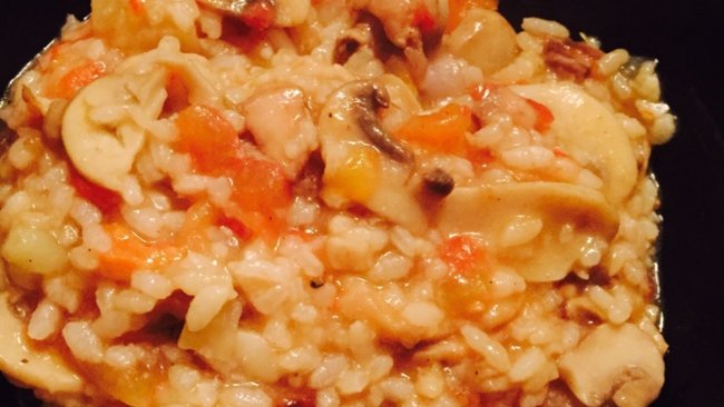 蘑菇鸡腿西红柿烩饭的做法