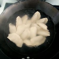 汤汁鲜美的猪肉白菜大饺子的做法图解11