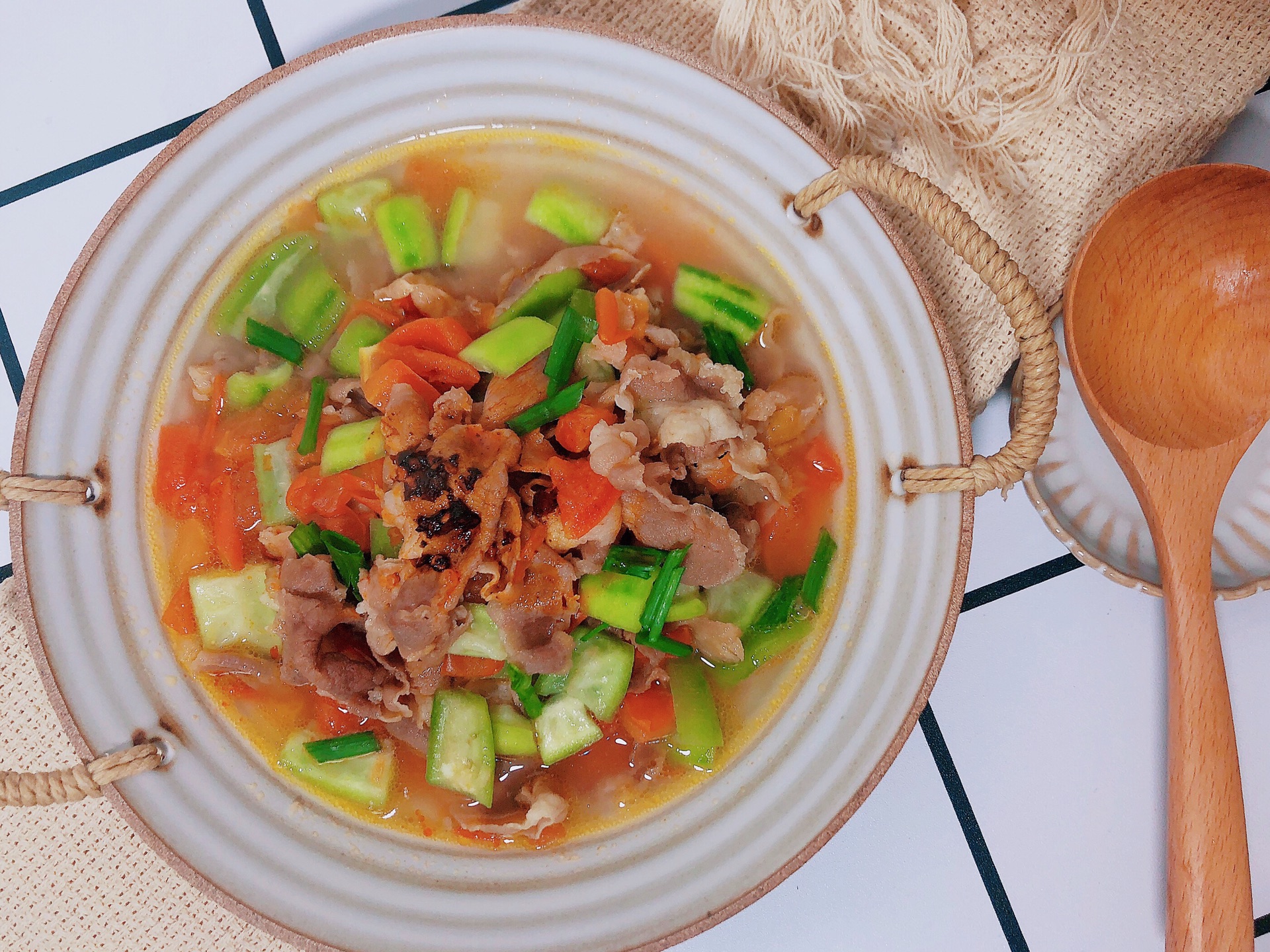 Tomato, beef and towel gourd soup