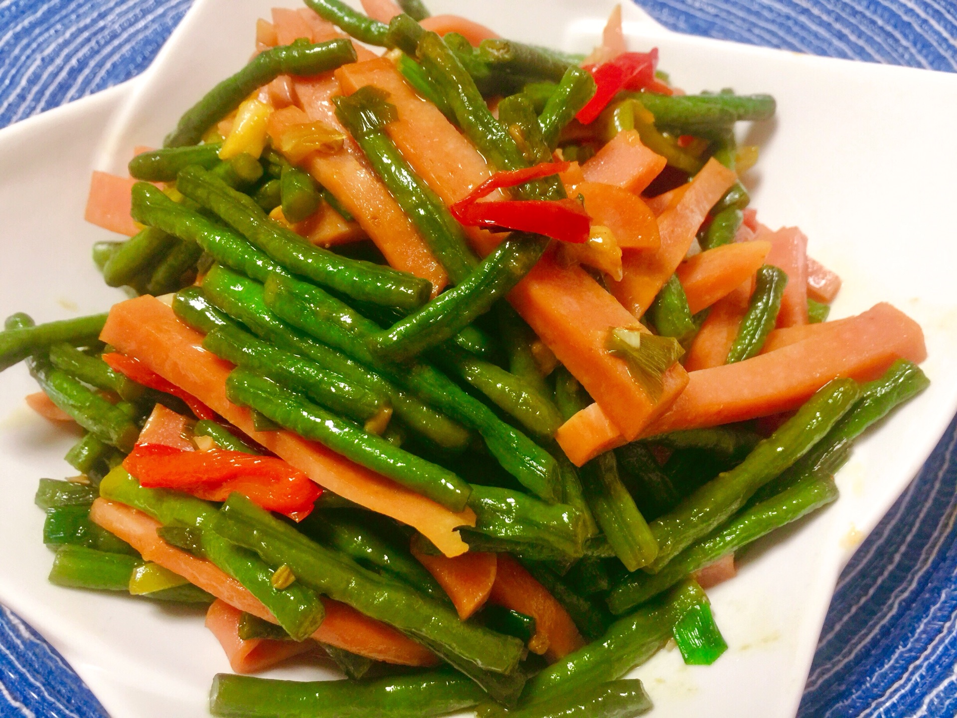 Stir fried ham with cowpea and chili