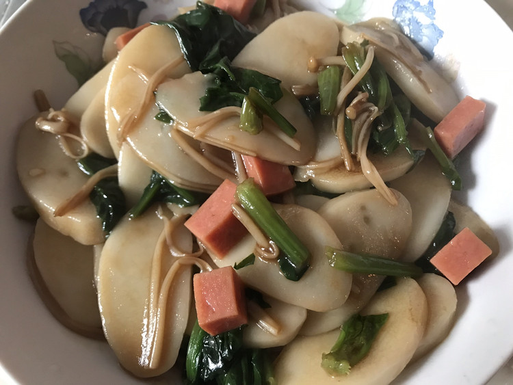 菠菜炒年糕的做法