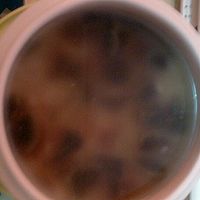 皮蛋火腿粥的做法图解3