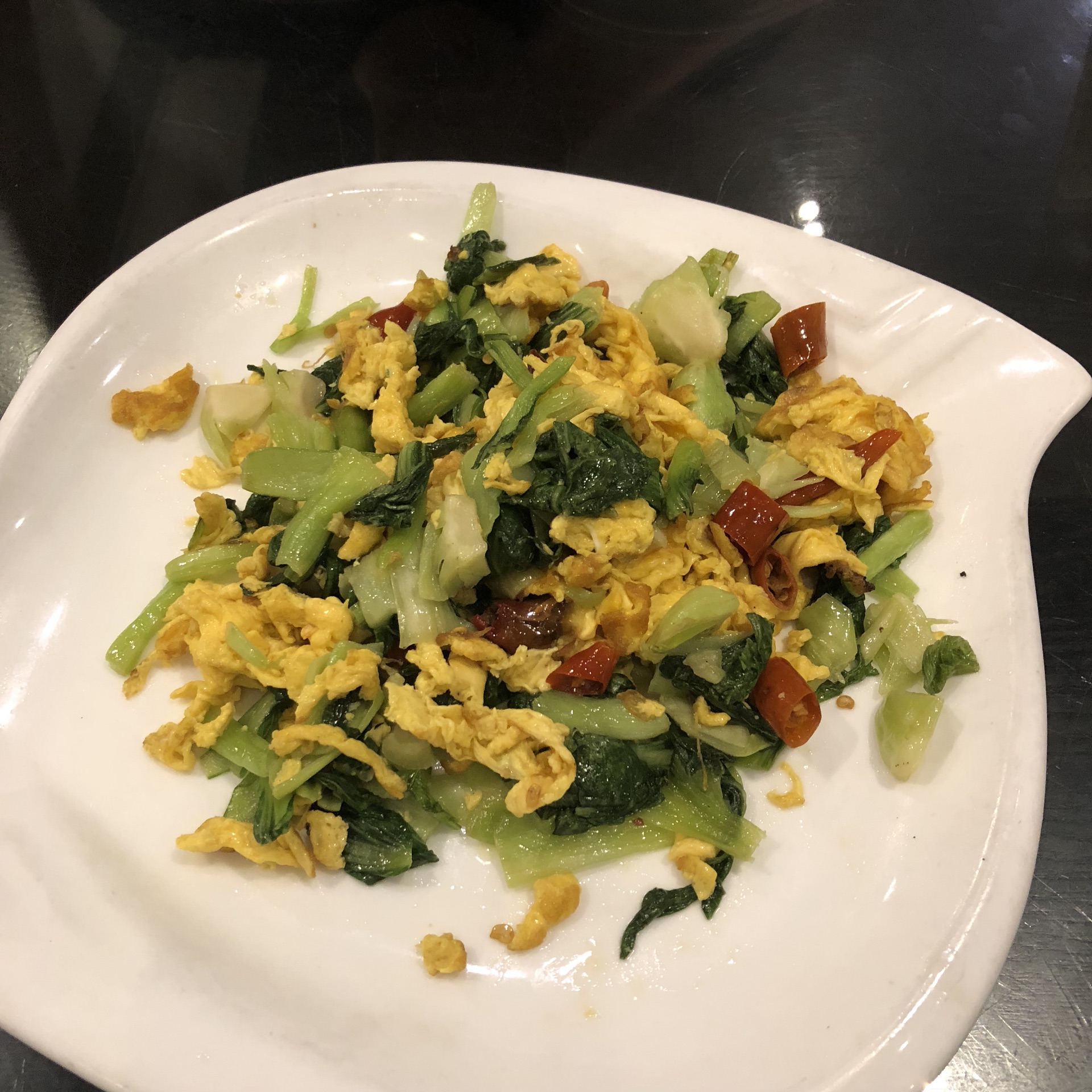 Fried eggs with pickled vegetables