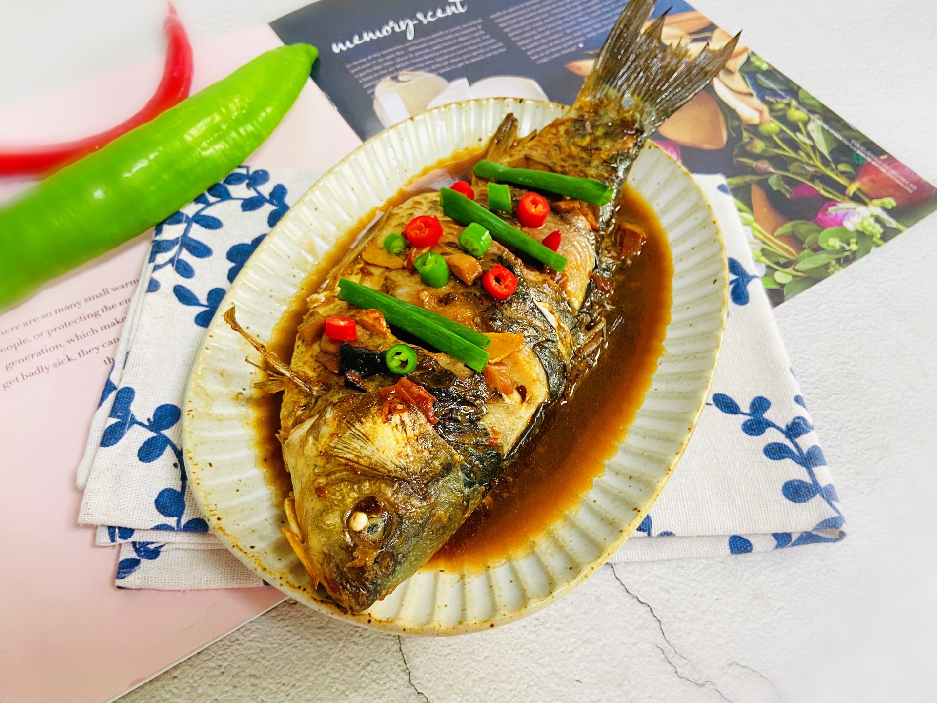 Braised crucian in sauce