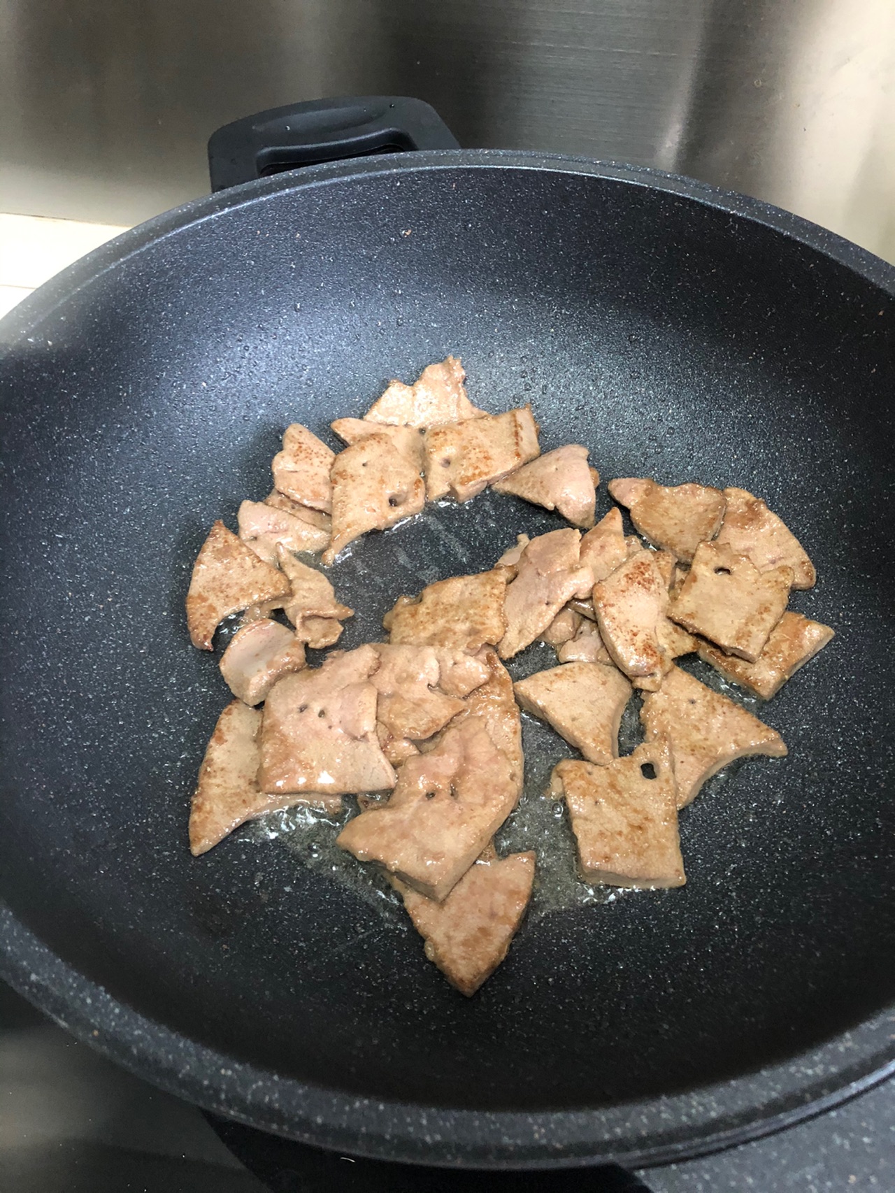 怎么炒口感都不老的—炒猪肝的做法图解4