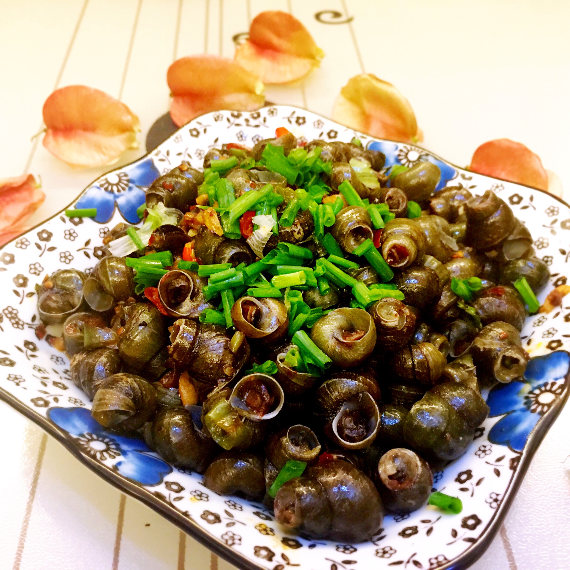 Stir fried snails with mint