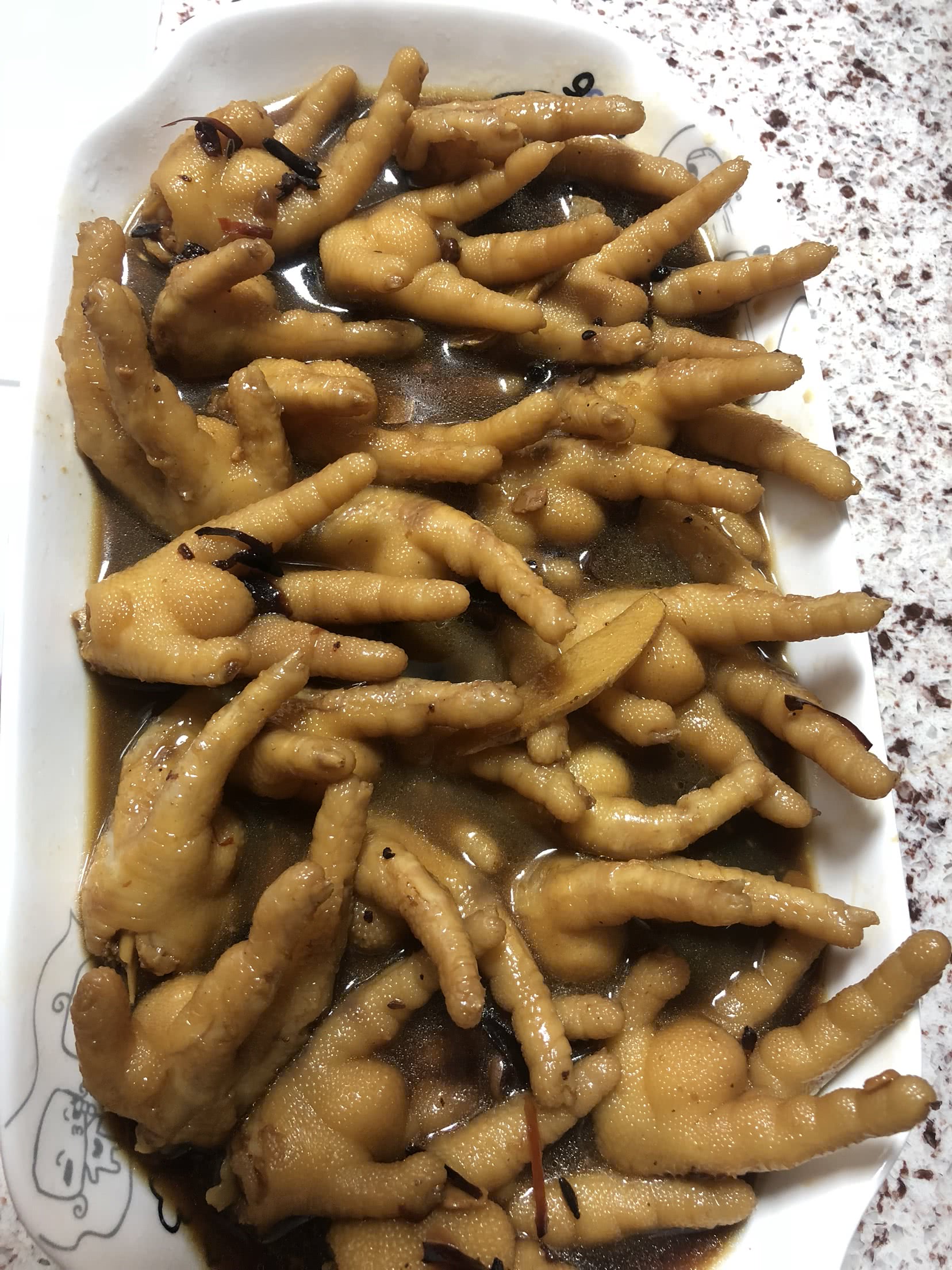Stewed chicken feet with wine and vegetables