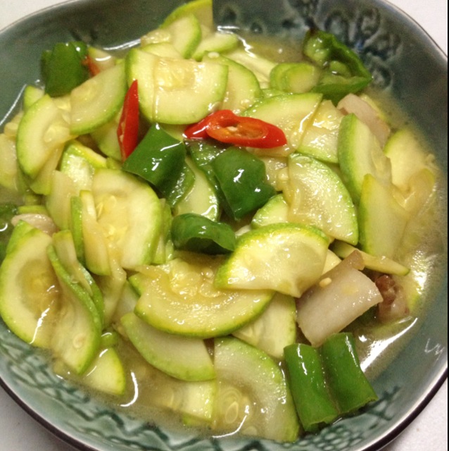 Fried pork slices with zucchini