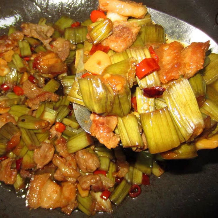 酸芋苗炒肉的做法