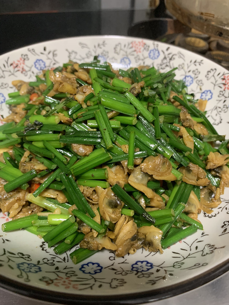 花甲肉炒韭菜花的做法