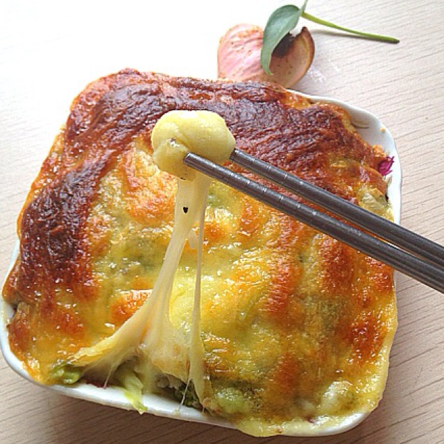 Baked rice with cheese