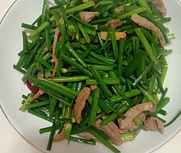 韭菜苔炒肉的做法