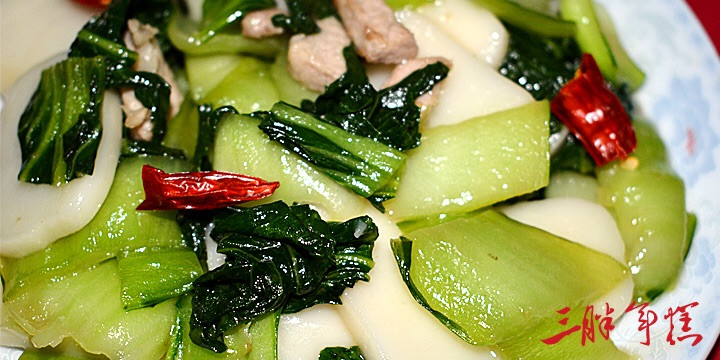 青菜肉丝炒年糕的做法