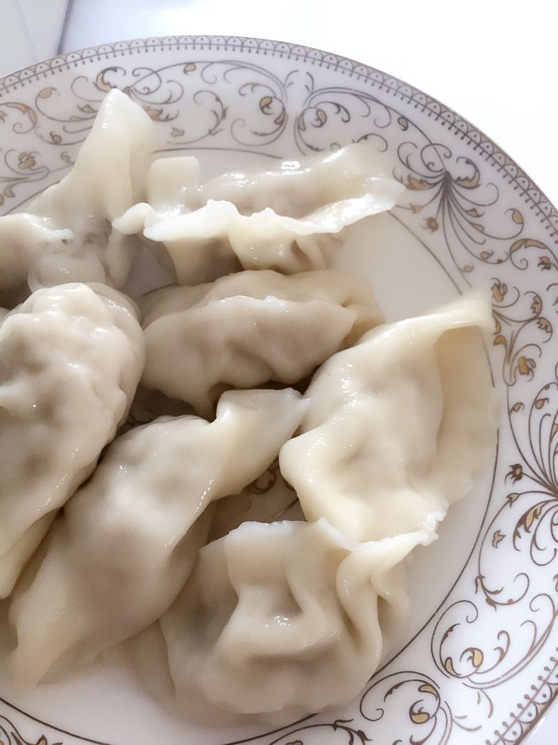 Hand made dumplings with lotus root and pork