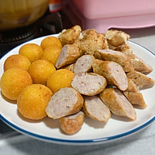 家庭简易小吃套餐，炸鸡块德国香肠地瓜香芋丸