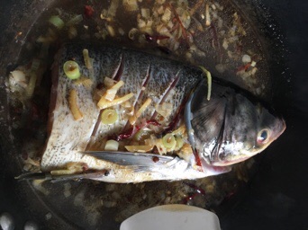 Braised silver carp head with sauce