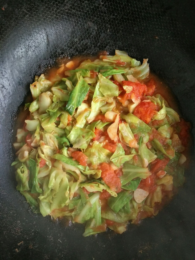 西红柿炒包菜的做法